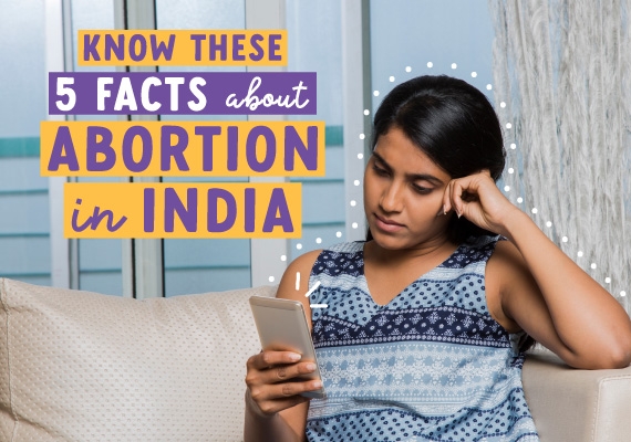 Indian girl scrolling through facts she found online about abortions in India